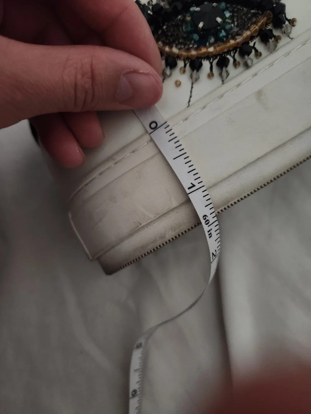 Kurt Geiger White Low-Top Sneakers with Black Heel and Embellishment